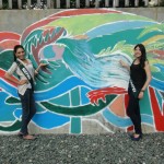 Nagma Shrestha proudly showcasing mural painting
